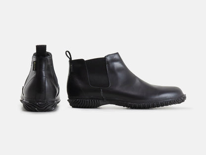 SPINGLE Bizのスニーカー「Biz-603 Black」の後ろ向きの商品画像