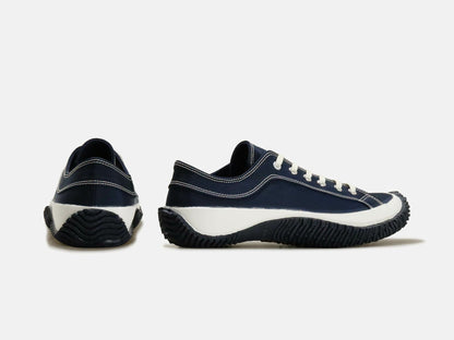 SPINGLE MOVEのスニーカー「SPM-172 Navy」の後ろ向きの商品画像